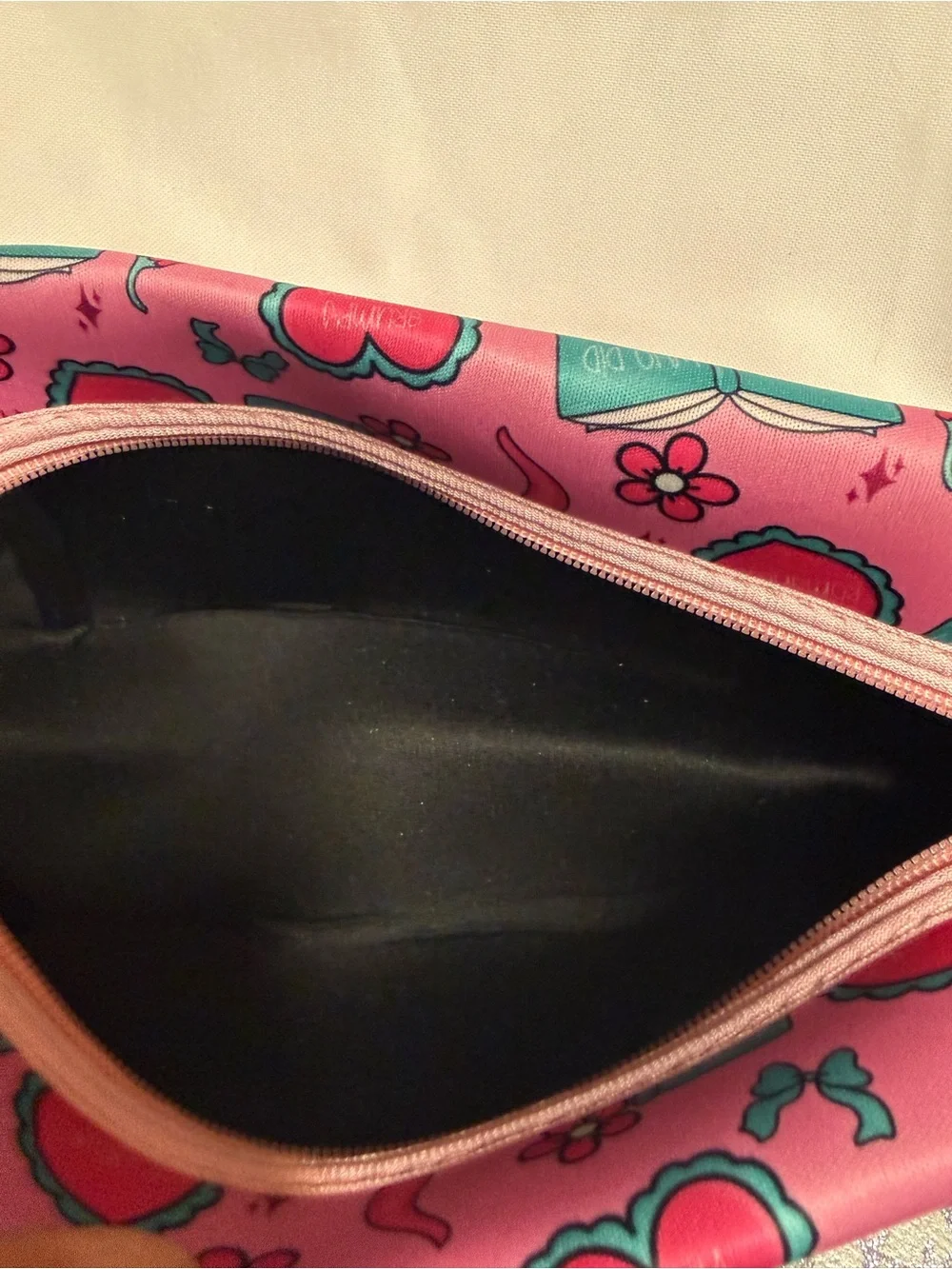 Pink Patterned makeup bag x two. You get both. Both brand new.